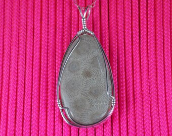 P#454 SS Petoskey stone  wire wrapped with solid sterling silver.