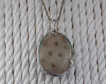 PP#502 Petoskey stone  wire wrapped with solid sterling silver.