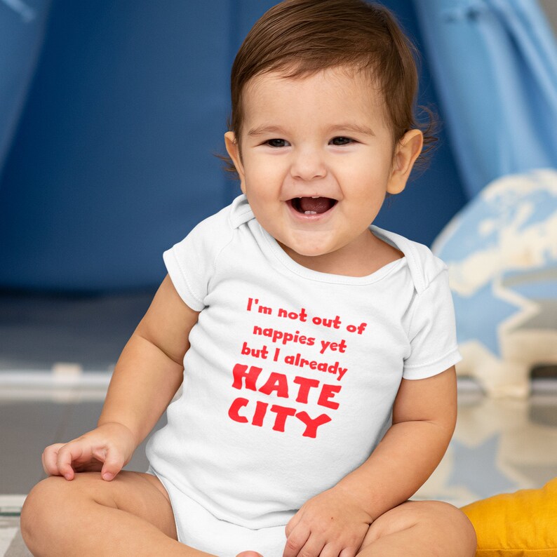 Manchester United Baby Gift. Hate City Baby Grow. Laughing Baby Boy