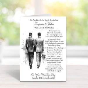 May include: A black and white illustration of two grooms in suits standing together. The image is on a white card with a wedding poem and the text "On Your Wedding Day, Saturday 28th September 2024".