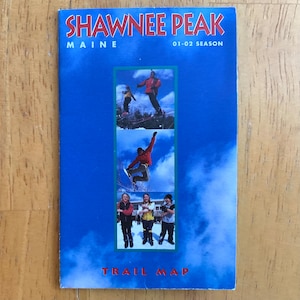 May include: A blue Shawnee Peak trail map with images of skiers and snowboarders. The text "SHAWNEE PEAK MAINE 01-02 SEASON" is at the top, and "TRAIL MAP" is at the bottom. The background is a gradient of blue.