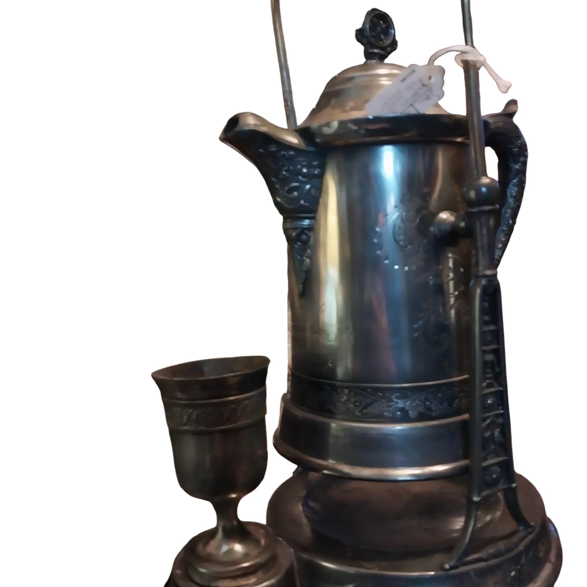 Beautiful Victorian Silverplate Pitcher Tilting on Stand