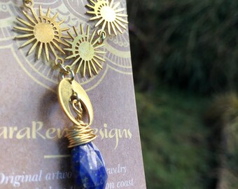 Wire wrapped Lapis lazuli  necklace with moon and sun charms and 14k chain.
