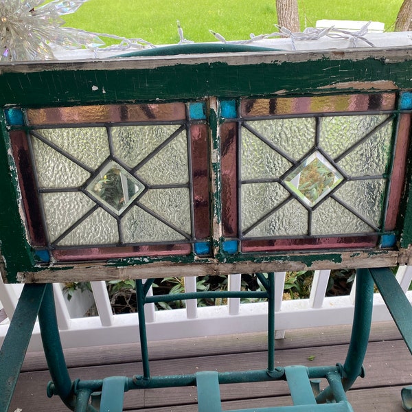 Antique salvaged stained glass window in original wood frame leaded glass beveled glass colored glass