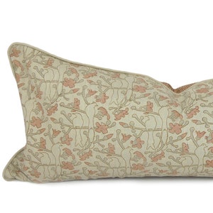 Birds in blossom woodblock printed linen lumbar cushions.