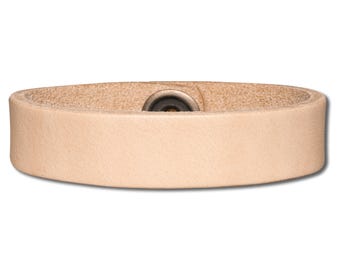 May include: A light beige leather bracelet with a metal snap closure.