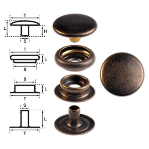 May include: A set of four antique brass snap fasteners, including a cap, socket, stud, and post. The fasteners are used for attaching fabric or leather together.