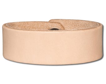 May include: A light beige leather strap with a single hole for a buckle. The strap is approximately 2.5 cm wide.