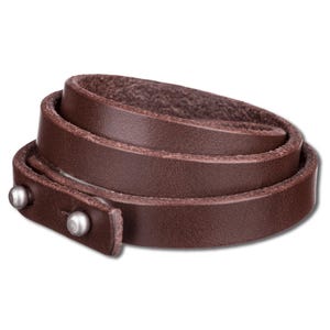 May include: A brown leather wrap bracelet with two silver metal accents.