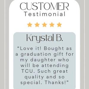 May include: A customer testimonial with a five-star rating for a product. The testimonial reads "Love it! Bought as a graduation gift for my daughter who will be attending TCU. Such great quality and so special. Thanks!" The testimonial is attributed to Krystal B.