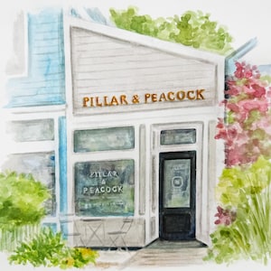 May include: A watercolor painting of a storefront with blue siding and a white facade. The text PILLAR & PEACOCK is displayed above the entrance and on the window. The building is surrounded by green bushes and a flowering pink bush on the right side.
