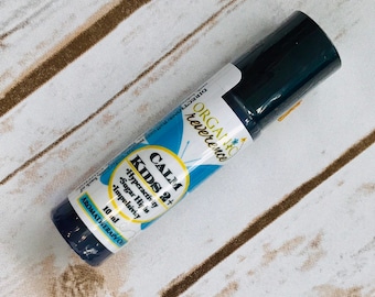 Mezcla de aceites esenciales CALM KID y aceite orgánico de aromaterapia en roll-on para hiperactividad, niveles altos y bajos de azúcar y comportamiento impulsivo.
