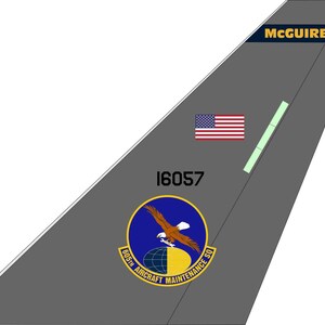 May include: A gray aircraft tail with the text "MCGUIRE" in yellow and a small airplane icon. The tail also features a US flag, a green stripe, the number "16057", and a blue circle with a yellow eagle and the text "605TH AIRCRAFT MAINTENANCE SQ".