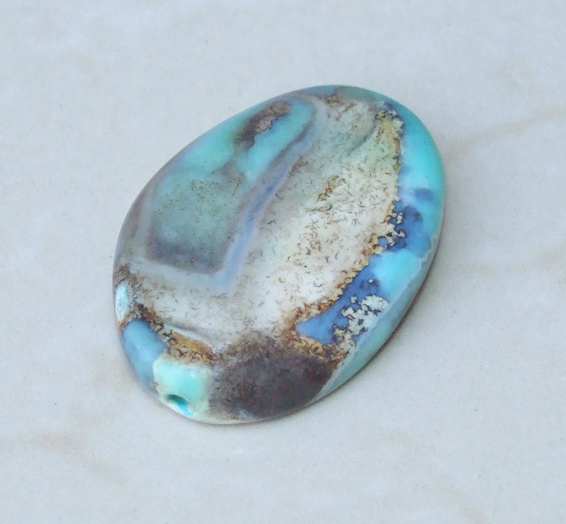 36mm Center Drilled Pale Blue Agate Twisted Oval Bead Pendant Polished Stone