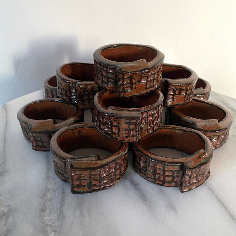 Vintage MCM Brick Design Ceramic Glazed Pottery Folk Art Napkin Rings Set of 12 image 1
