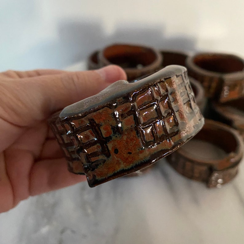 Vintage MCM Brick Design Ceramic Glazed Pottery Folk Art Napkin Rings Set of 12 image 2