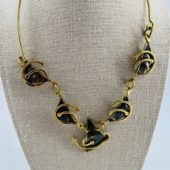 Artisan Brown enamel and gold swirl necklace art d
