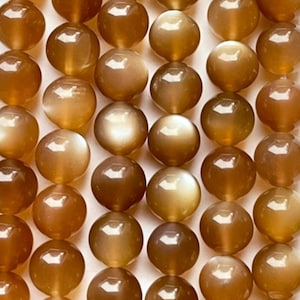 AAA Natural rainbow moonstone beautiful natural flash on each bead. 6mm 8mm 10mm round bead. Gorgeous brown moonstone bead. High quality  !