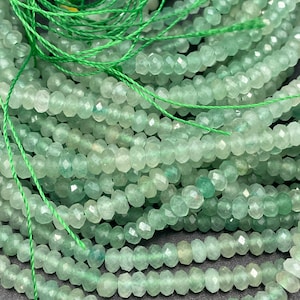 AAA Natural green jade gemstone bead. Faceted 2x3mm Rondelle shape bead. Gorgeous natural light green color jade gemstone. High quality jade