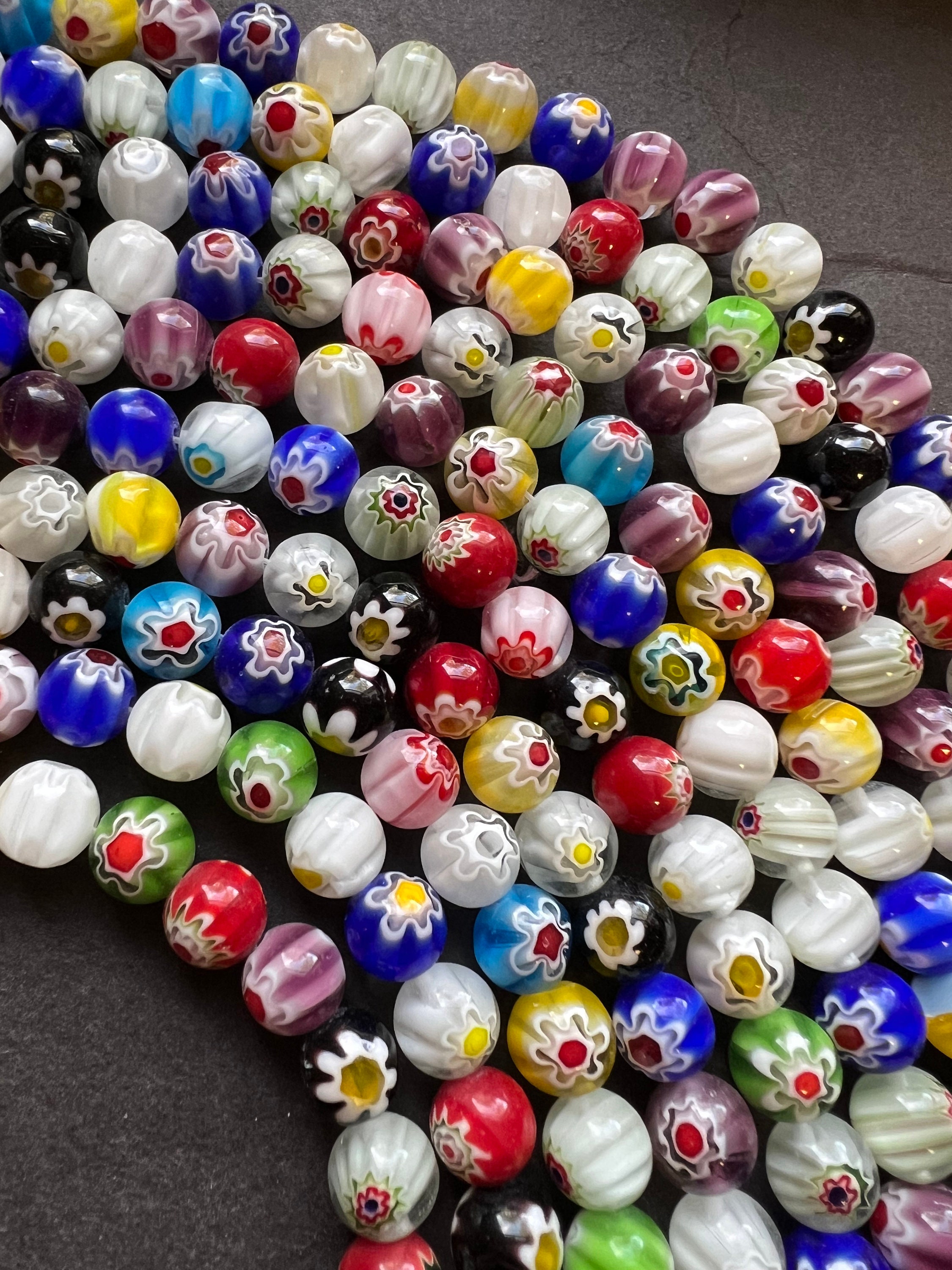 string of beads (17x = .10a): 16 amber beads, 1 millefiori bead, string of  beads (17x), glass, organic, amber, 1,4 x 1,8 cm, vmeb 450-700,  Netherlands, South Holland, Katwijk, Rijnsburg, burial ground Stock Photo -  Alamy