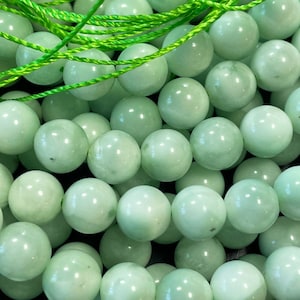 Natural green moonstone green angelite stone bead . 6mm 8mm 10mm round bead. Gorgeous light green color high quality bead!
