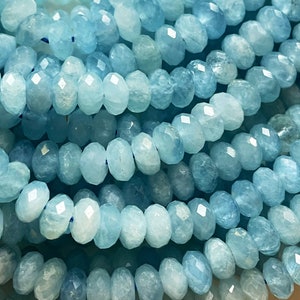 AA Natural Aquamarine stone bead. Faceted 4x7mm 5x8mm Rondelle Shape. Gorgeous natural sea blue Aquamarine gemstone . Super nice quality !