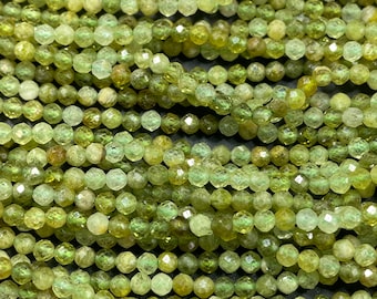 A AA natural green garnet gemstone bead. Faceted 4mm round bead. Gorgeous natural olive green color. Green garnet stone bead . Full strand
