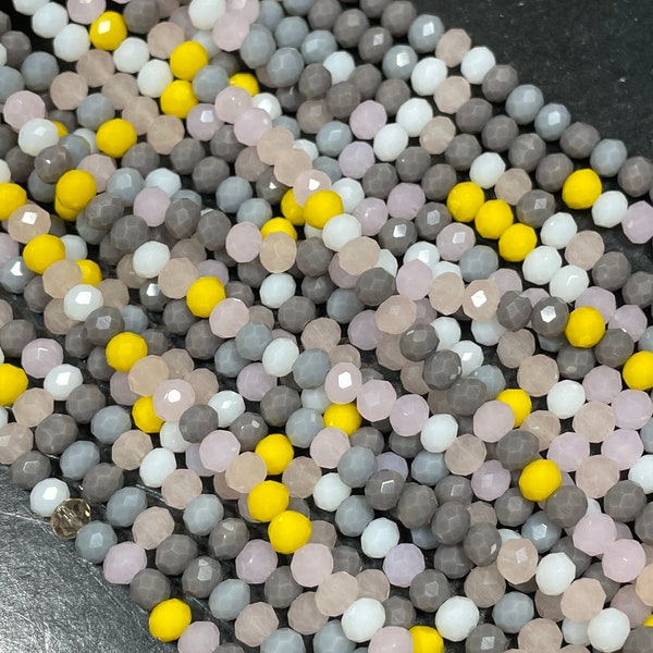 Beautiful multi color crystal bead . 2mm4mm  Roundell shape. Beautiful rose pink clear yellow gray multi color crystal bead. Full strand