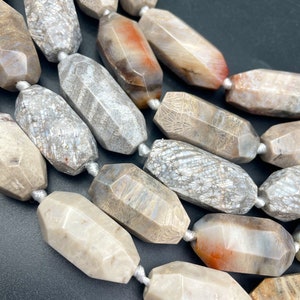AAA Natural fossil coral stone bead. Faceted 14x40mm barrel shape. Gorgeous natural color fossil coral gemstone. High quality beads !