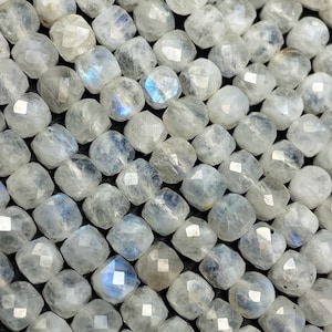 AA natural  moonstone bead . Faceted cube shape bead. Beautiful natural white moonstone with blue flash on . High quality gemstone bead
