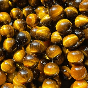 AAA Natural tiger eye stone bead . 4mm 6mm 8mm 10mm 12mm round bead. Gorgeous golden brown color tiger eye . Great quality gemstone . 15.5 image 1