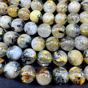 Natural gold rutilated quartz  gemstone bead. smooth round bead. excellent quality. unique gold rutilated quartz. full strand 15.5”