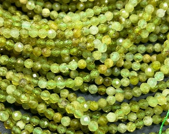 A AA natural green garnet gemstone bead. Faceted 2.5mm round bead. Gorgeous natural olive green color. Green garnet stone bead . Full strand
