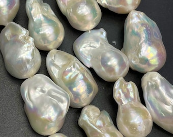 AA natural baroque pearl bead. Natural freedom shape. About 15-30mm . Beautiful natural white color baroque pearl. Beautiful shape . 15.5”