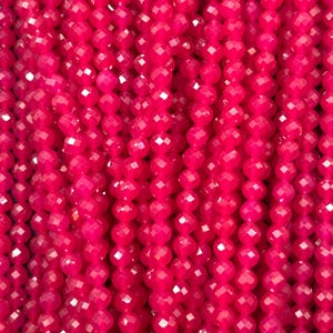 May include: Close-up of strands of faceted, hot pink beads. The beads are strung together, creating a dense, textured surface. The beads have a glossy finish, reflecting light and adding depth to the vibrant color. Ideal for jewelry making.