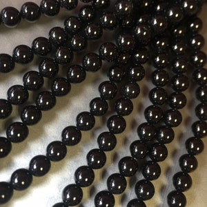 AAA天然ブラックオニキスビーズ。4mm、6mm、8mm、10mm、12mmのラウンドビーズ。天然宝石ビーズ。15.5インチのストランド。ジュエリー作りに最適です。