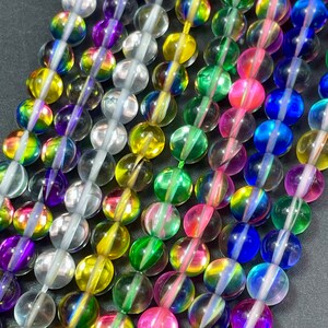 thumbnail image 2 of Black Blue Mystic Mermaid Glass Smooth Round Beads – 6mm 8mm 10mm 12mm – 15.5 Strand Lot 2 of 4