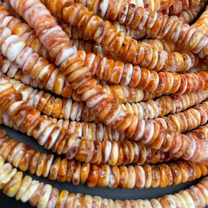 AAA Natural spiny oyster shell bead. 8mm brown Rondelle shape. Gorgeous natural yellow orange color spiny oyster shell bead. Full strand 15.