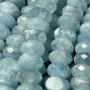 AAA Natural blue aquamarine stone bead . Faceted 4x7m 5x8mm 6x9mm 6x10mm Rondelle Shape. Beautiful natural blue color. Real nice quality !
