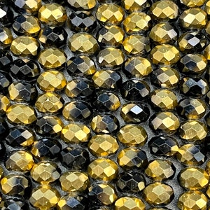 Beautiful Chinese crystal. Faceted 5x8mm Rondelle shape bead. Gorgeous black and gold ombre colors, great quality crystal. Full strand 15.5"