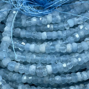 AAA Natural aquamarine gemstone bead . 6mm Rondelle shape . Super nice quality . Gorgeous natural aqua blue color . Full strand 15.5”