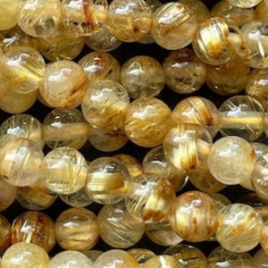 AAA Natural gold rutilated quartz stone bead . 4mm  6mm 8mm 10mm smooth round bead. Gorgeous natural golden yellow color rutilated quartz !