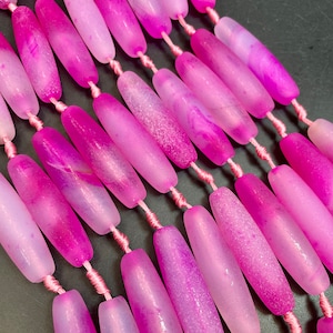 AAA Matte Botswana agate stone bead. Barrel Shape 13x48mm. Gorgeous pink, clear color. High quality gemstone, full strand.