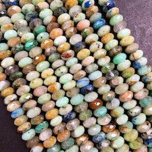 Natural chrysocolla. Faceted 4x6mm Rondelle bead . Beautiful natural brown color blue multi color chrysocolla. Gemstone . 15.5 strand