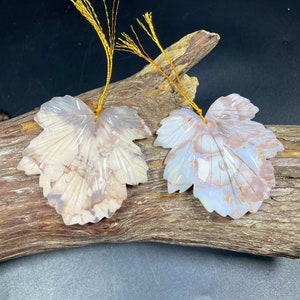 hand carved natural Charry blossom flower stone pendant . Gorgeous natural pink beige color. Unique maple leaf shape gemstone pendant .