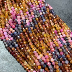 Natural ruby sapphire gemstone bead. Faceted 4mm round beads . Beautiful natural red ruby blue sapphire gemstone bead. Full strand 15.5”