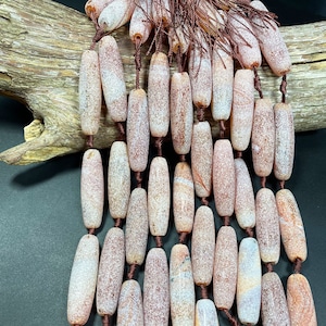 Natural matte brown agate. . 13x48mm barrel shape. Gorgeous natural brown color with matte finished gemstone bead. Loose stone bead