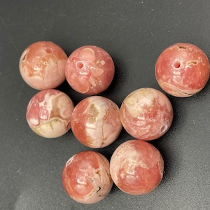 AAA 100% Natural rhodochrosite gemstone bead. 12mm round bead. Beautiful natural pink rhodochrosite high quality bead!