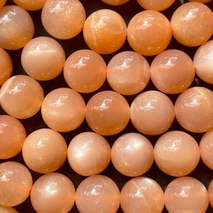 AAA Natural orange moonstone 6mm 8mm 10mm round bead.Beautiful natural orange color with gorgeous flash on . High quality moonstone bead .