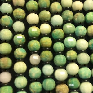 Natural amzonite beads . Natural gemstone beads . 10mm round beads . Faceted cut beads . Full strand 15.5” great for jewelry making.